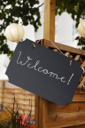 welcome-signs-hanging-outside